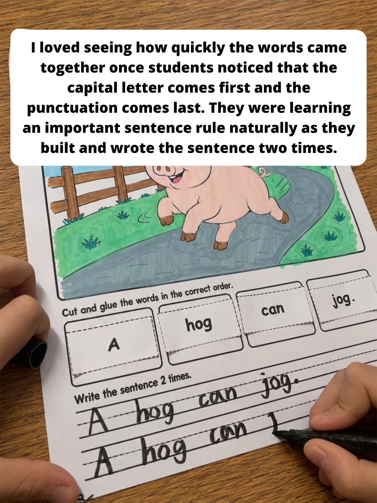 Student writing a completed CVC sentence on a worksheet